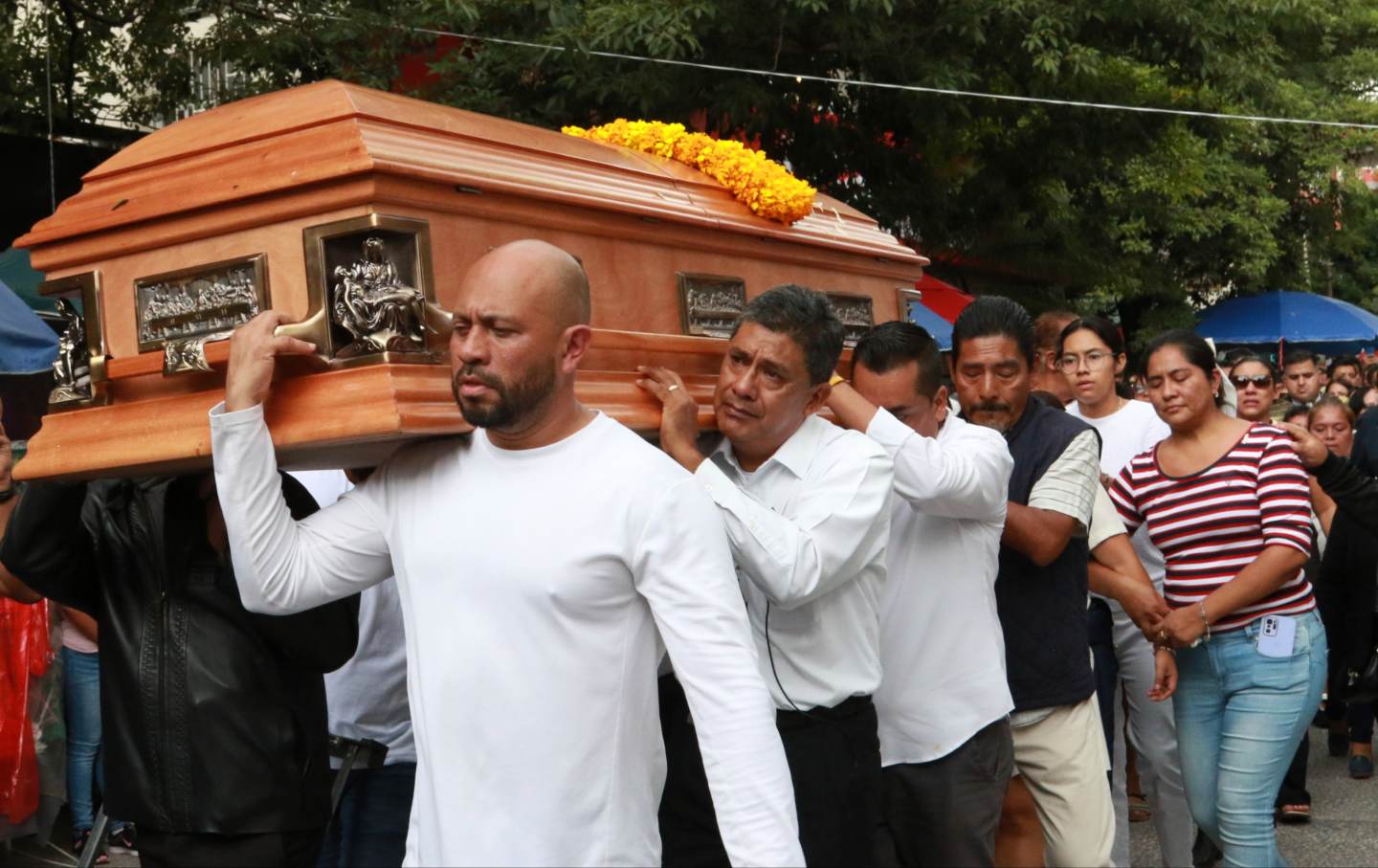 Relatives of slain Mayor Alejandro Arcos carry his coffin during his funeral service, one week after he took office, in Chilpancingo, Guerrero state, Mexico, Monday, October 7, 2024.