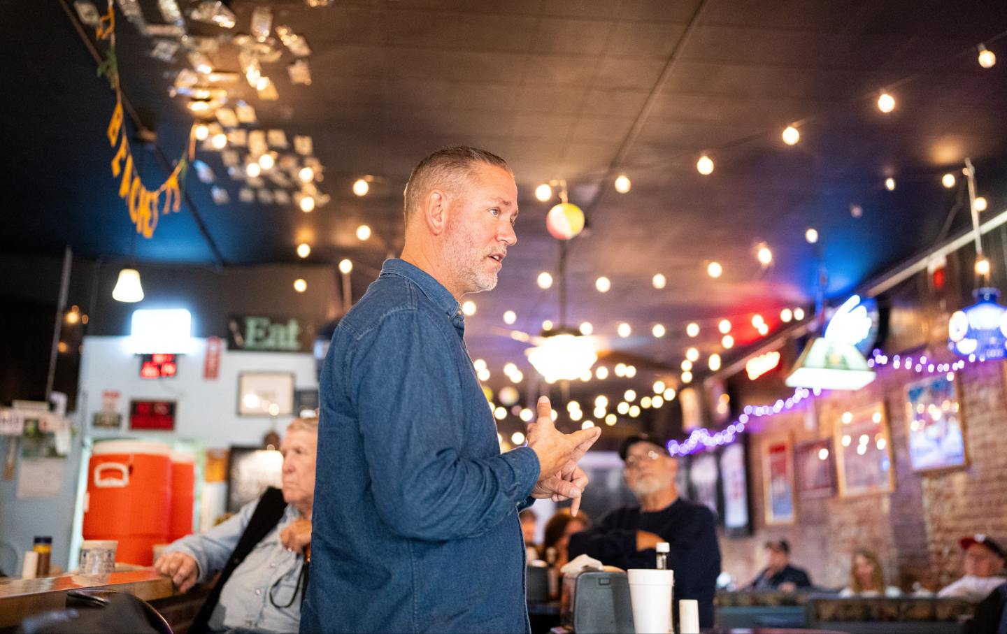 Independent Senate candidate Dan Osborn speaks during his campaign stop at Sly's Family Bar and Grill in Neligh, Neb., on Monday, October 14, 2024.