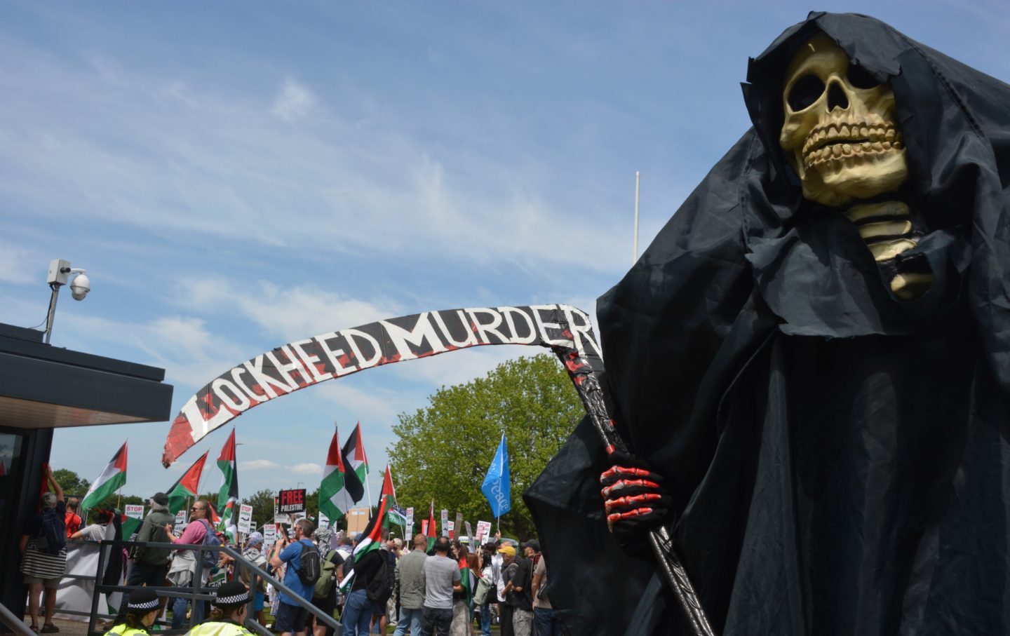 A protester dressed up as the Grim Reaper takes part in a demonstration organized by the Palestine Solidarity Campaign near the premises of Lockheed Martin UK in Havant, Hampshire, in protest against the shipment of F-35 components from Britain to Israel.