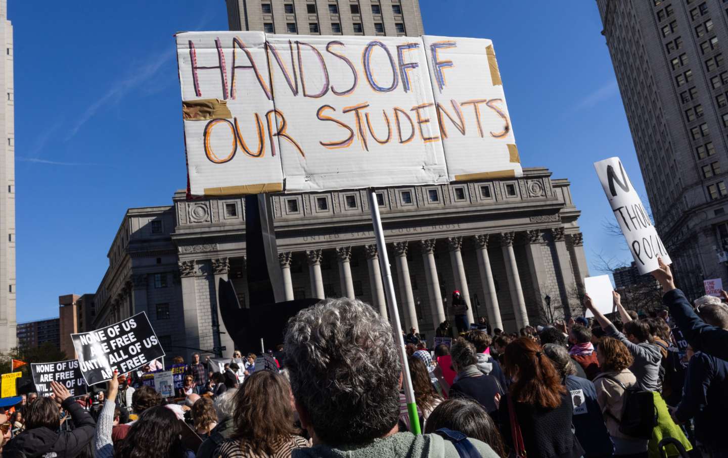 University faculty and students protest the detention and deportation of students under the Trump administration with a march and rally on April 17, 2025, in New York City.