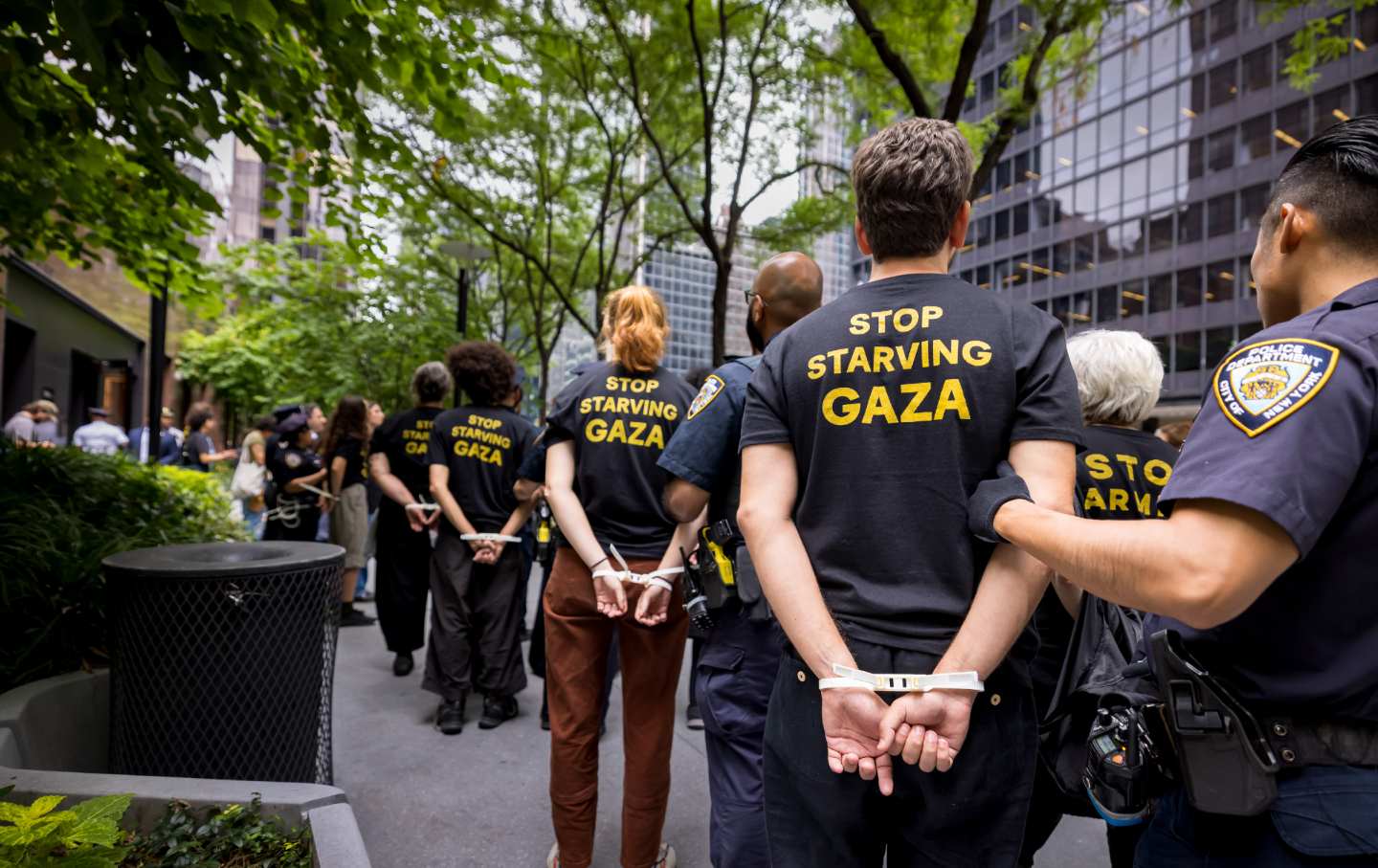 Members of Jewish Voice for Peace are led away after being arrested for occupying the New York offices of Senators Chuck Schumer and Kirsten Gillibrand on August 1, 2025.