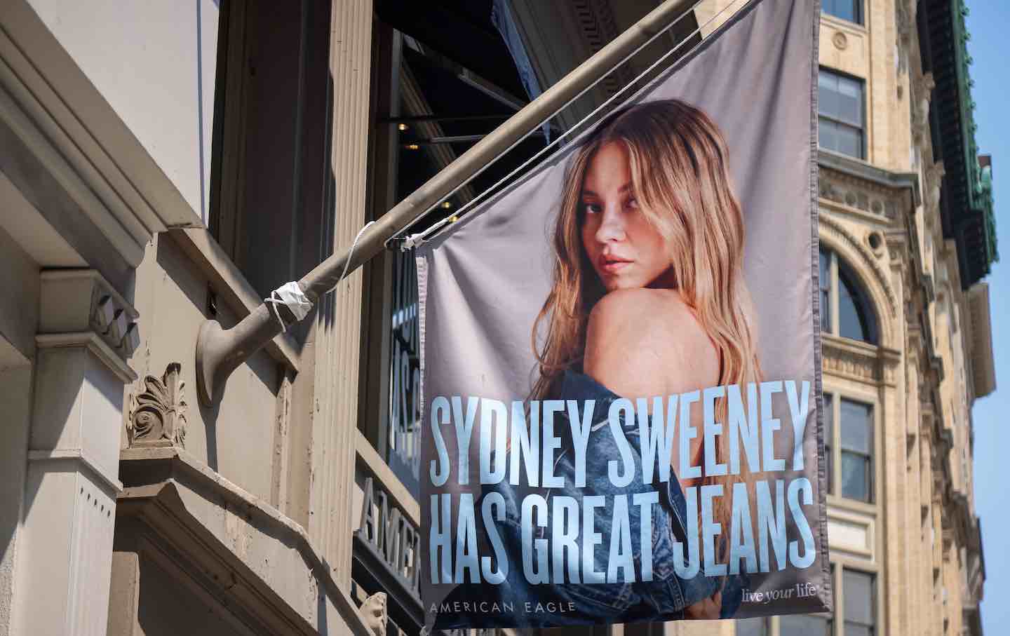 An advertisement featuring actress Sydney Sweeney outside an American Eagle store in New York City, on August 4. American Eagle Outfitters Inc. shares surged after US President Donald Trump came out in support of a controversial ad from the company featuring actress Sydney Sweeney.