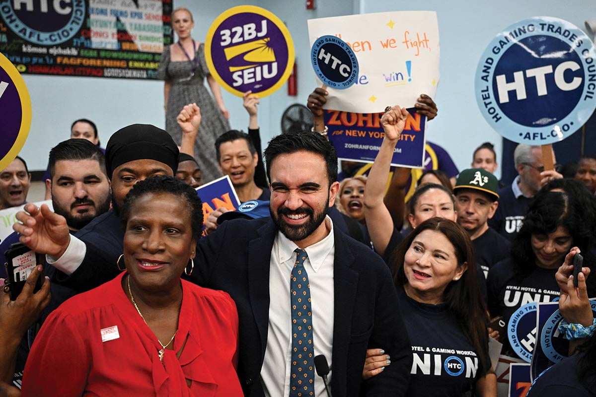 Mamdani celebrates his win on election night with New York union members.